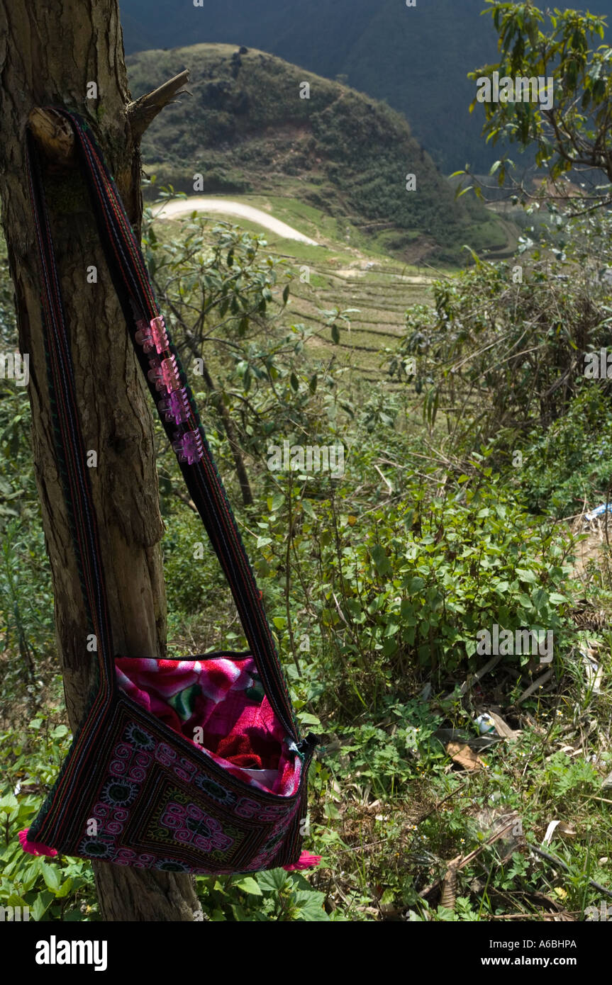 Traditional bag hanging on a tree overlooking rice terraces Sapa North Vietnam Stock Photo