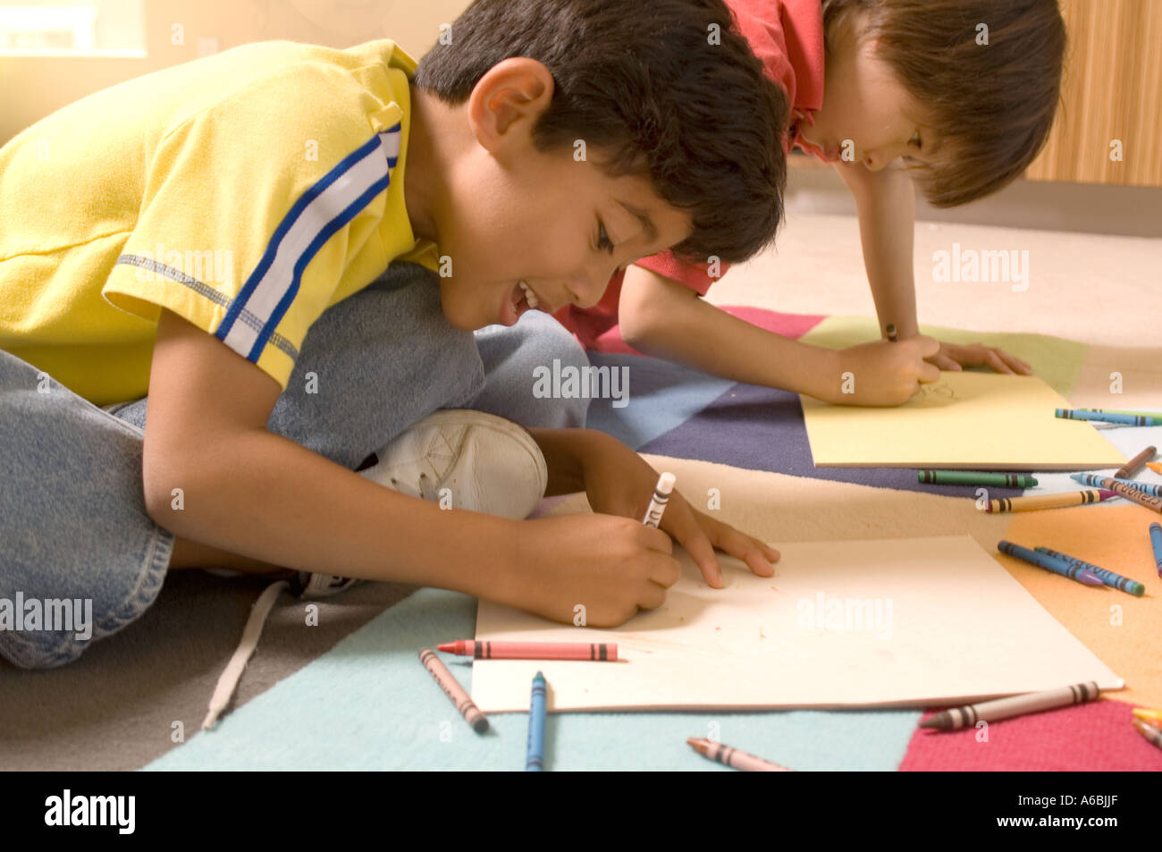 Portrait of Asian boy and Hispanic boy drawing Stock Photo - Alamy