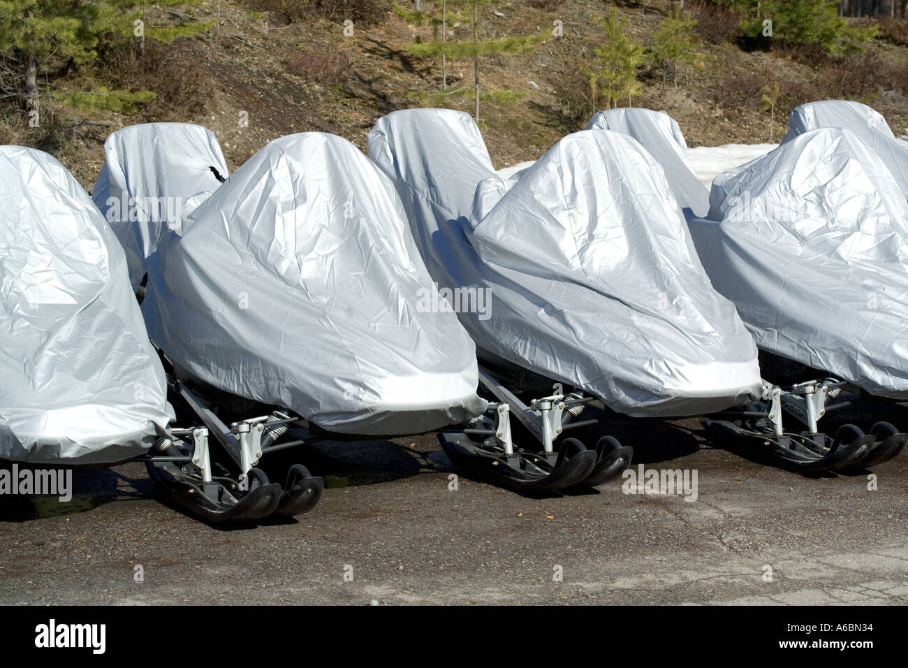 snow mobiles under cover Stock Photo
