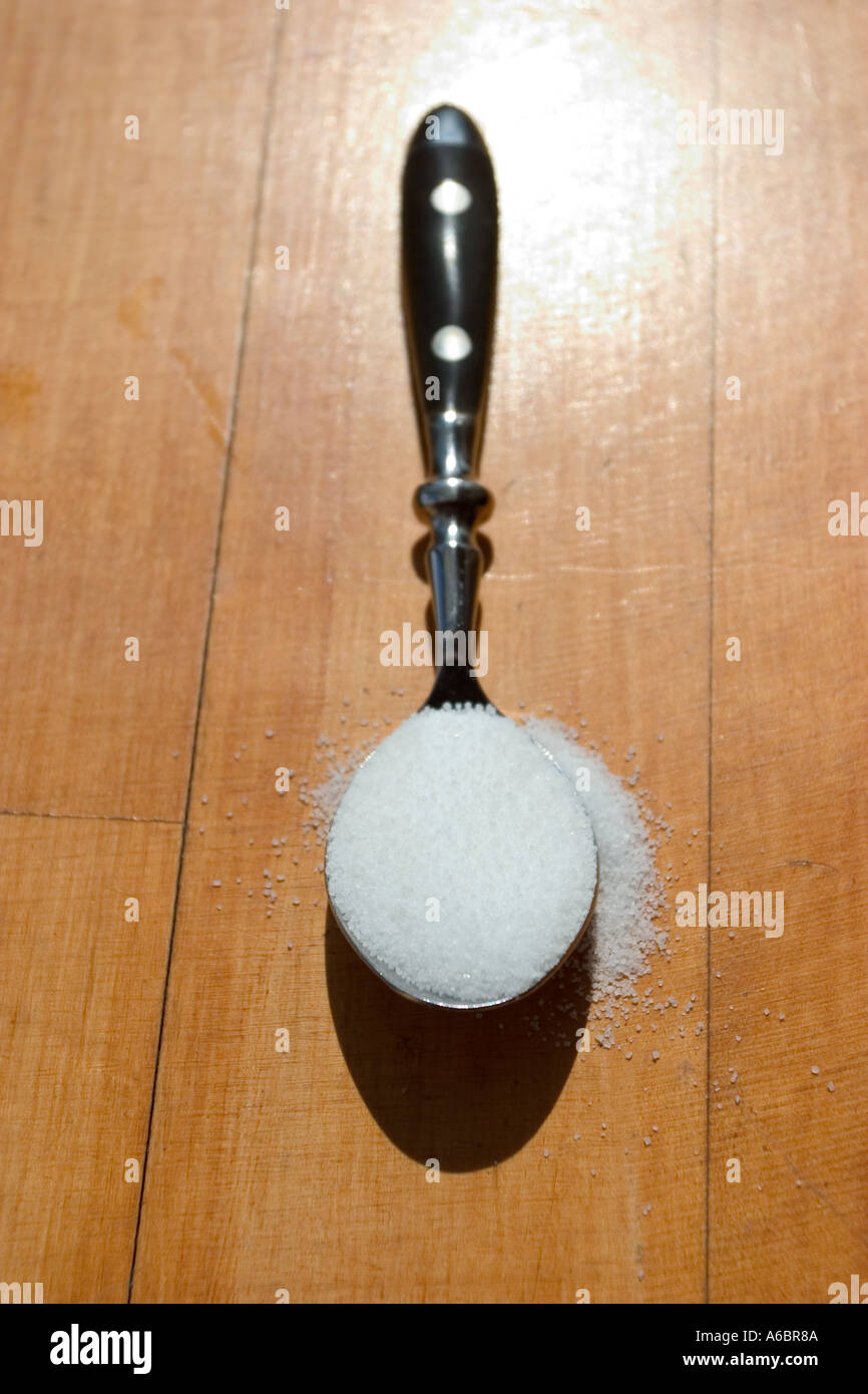 Spoonful sugar pouring hires stock photography and images Alamy