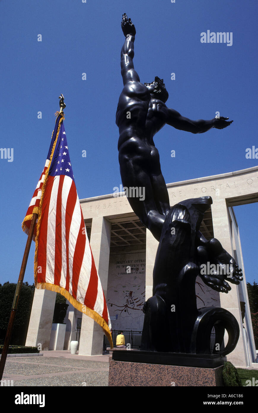 France Normandy Omaha Beach memorial statue flag at American military cemetary Stock Photo Alamy