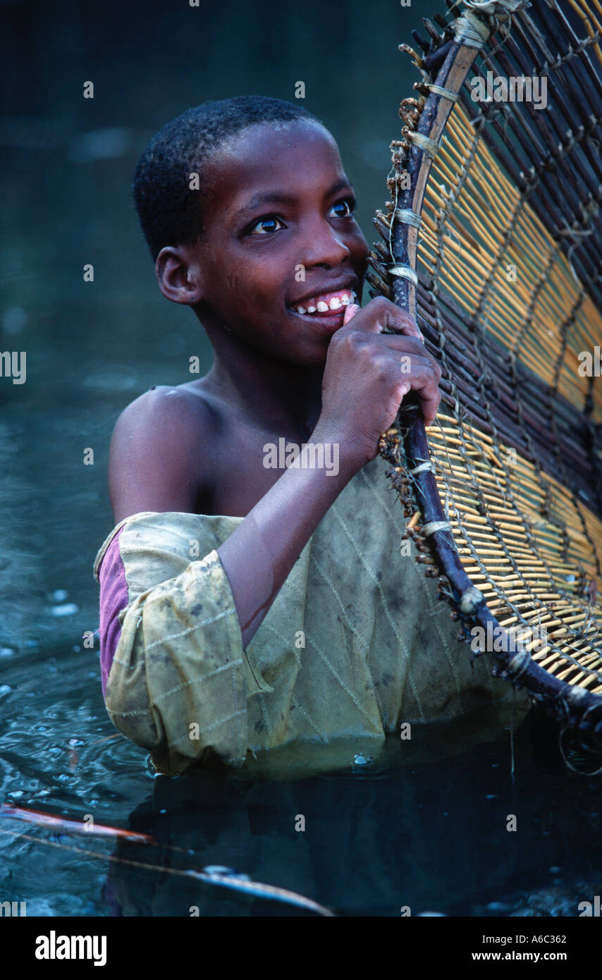 Botswana people Mabokushu tribe fishing with reed baskets Okovango Botswana Stock Photo