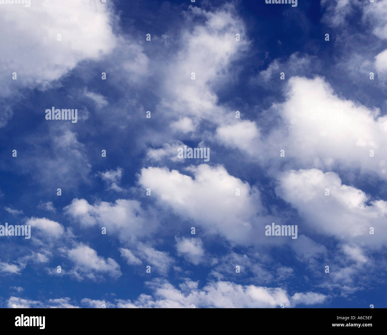 Altocumulus Clouds in blue sky Stock Photo - Alamy