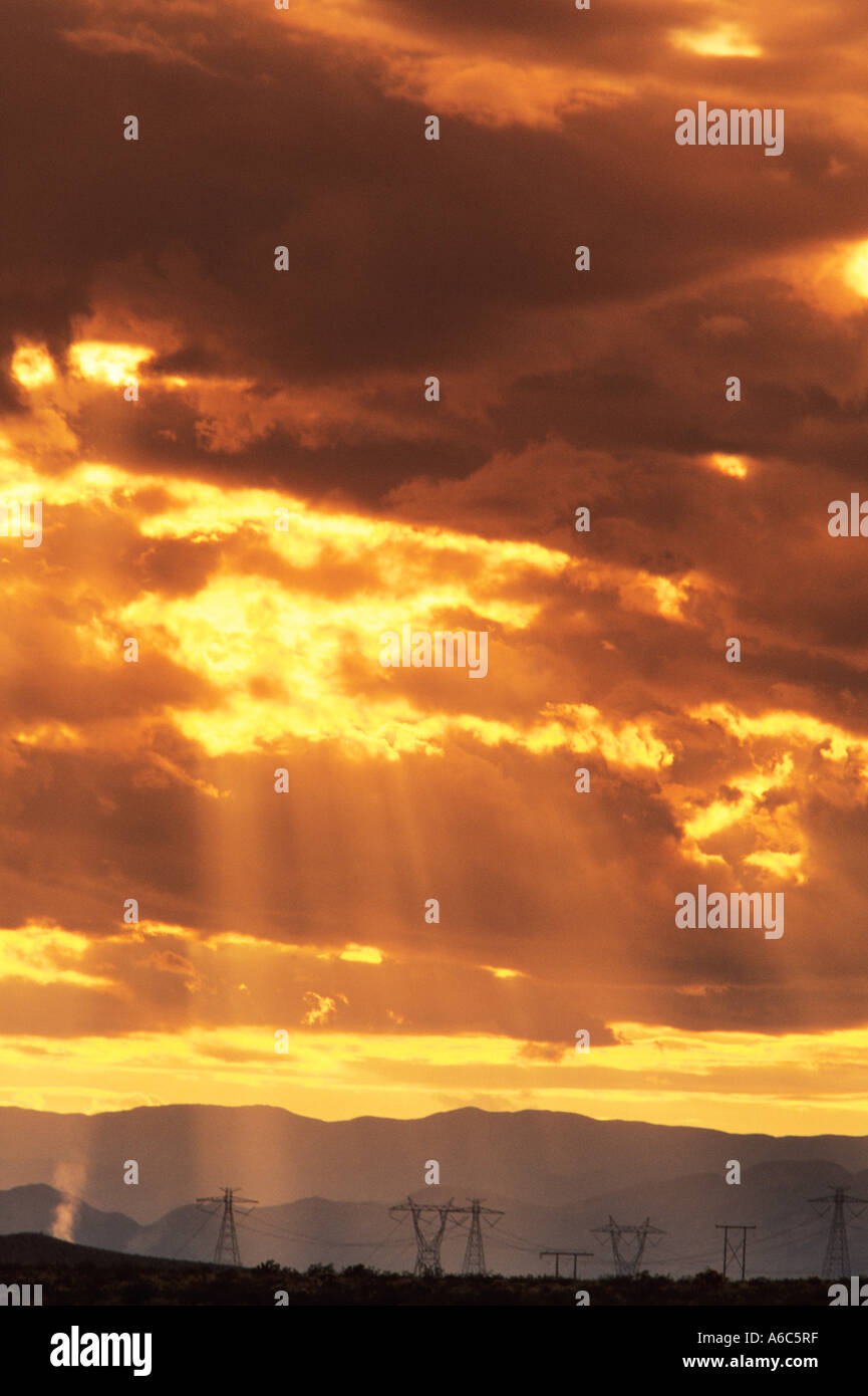 Sun rays and power lines Nevada USA Stock Photo - Alamy