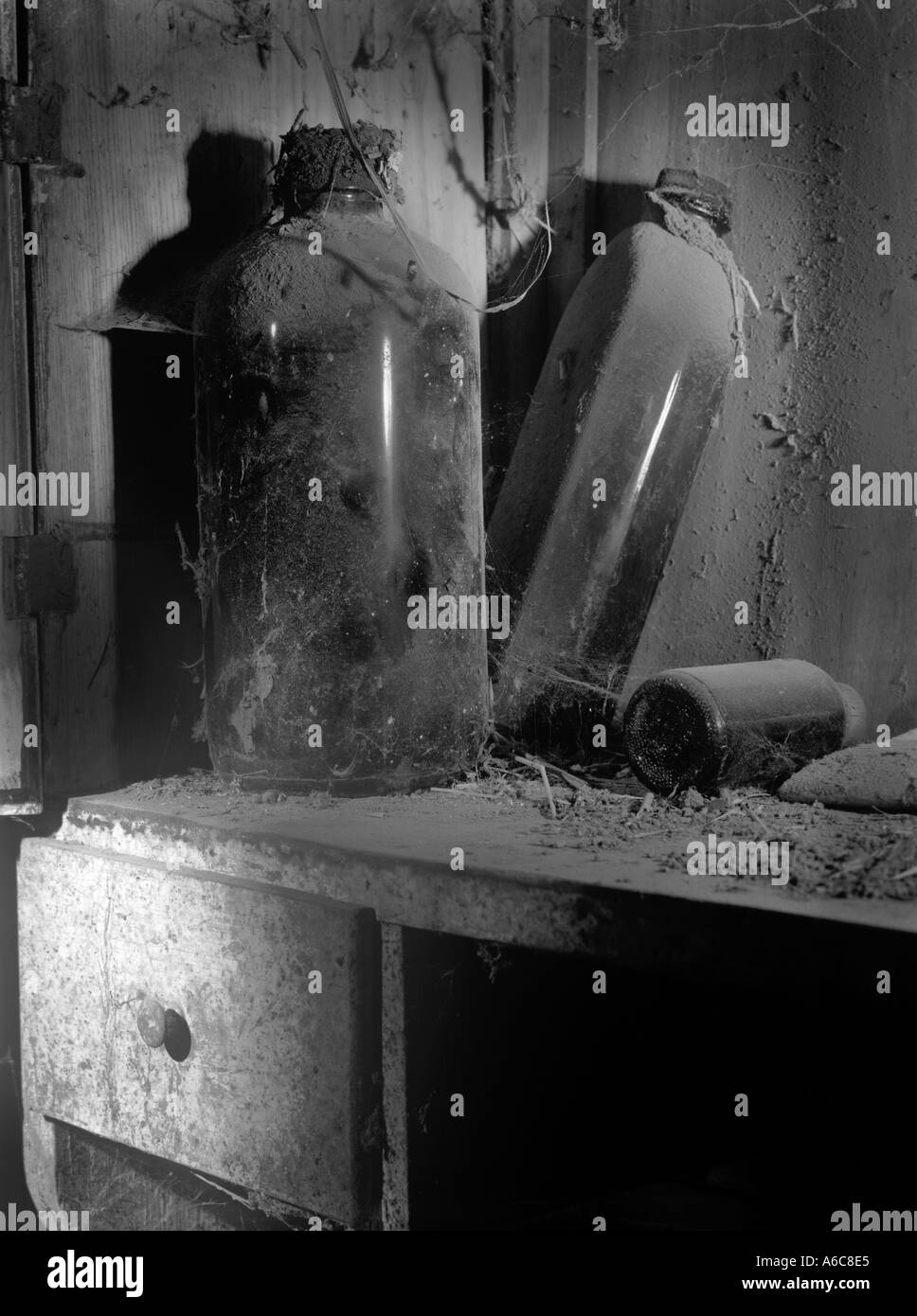 Bottles in old barn Stock Photo Alamy