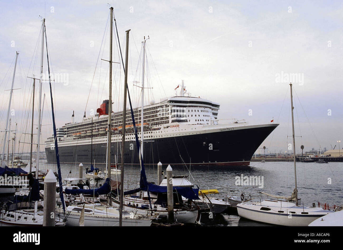 The Queen Mary 2 as she leaves Los Angeles and San Pedro harbor after her first visit Stock Photo