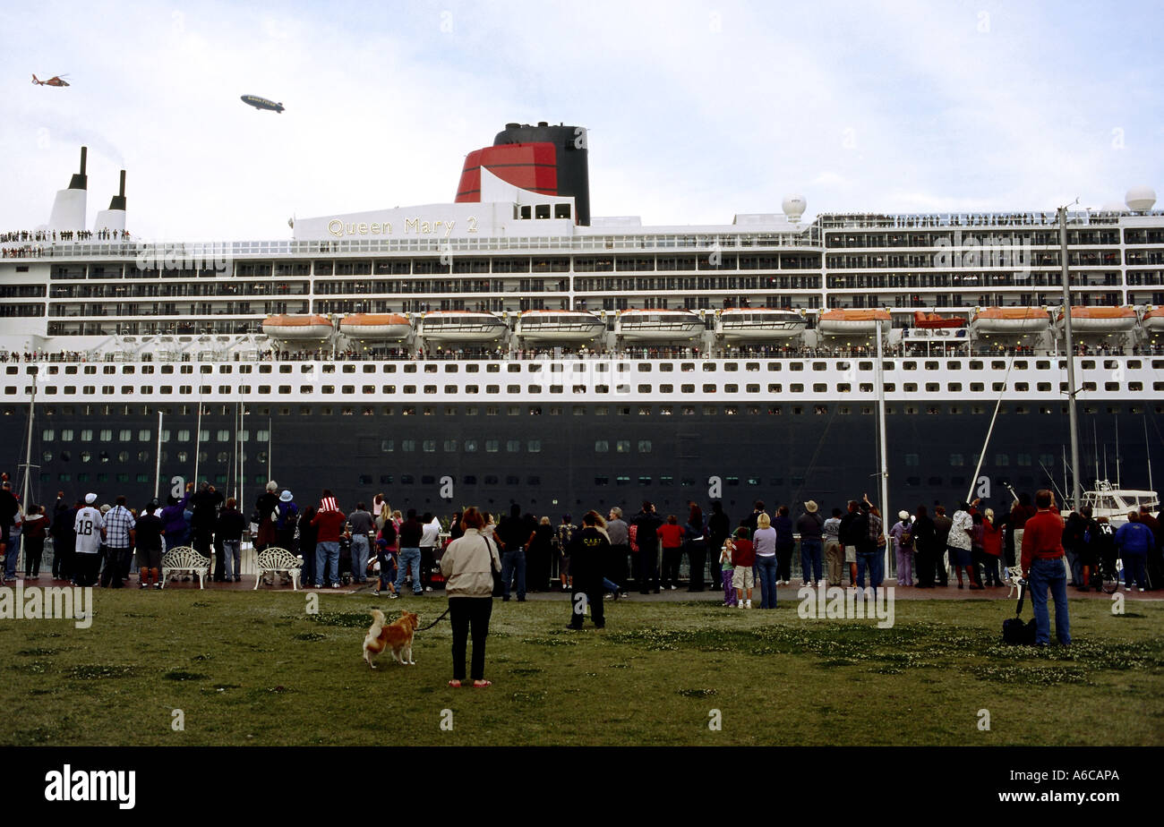 The Queen Mary 2 slowly passing through the Main Channel in San Pedro harbor before setting out to sea Stock Photo