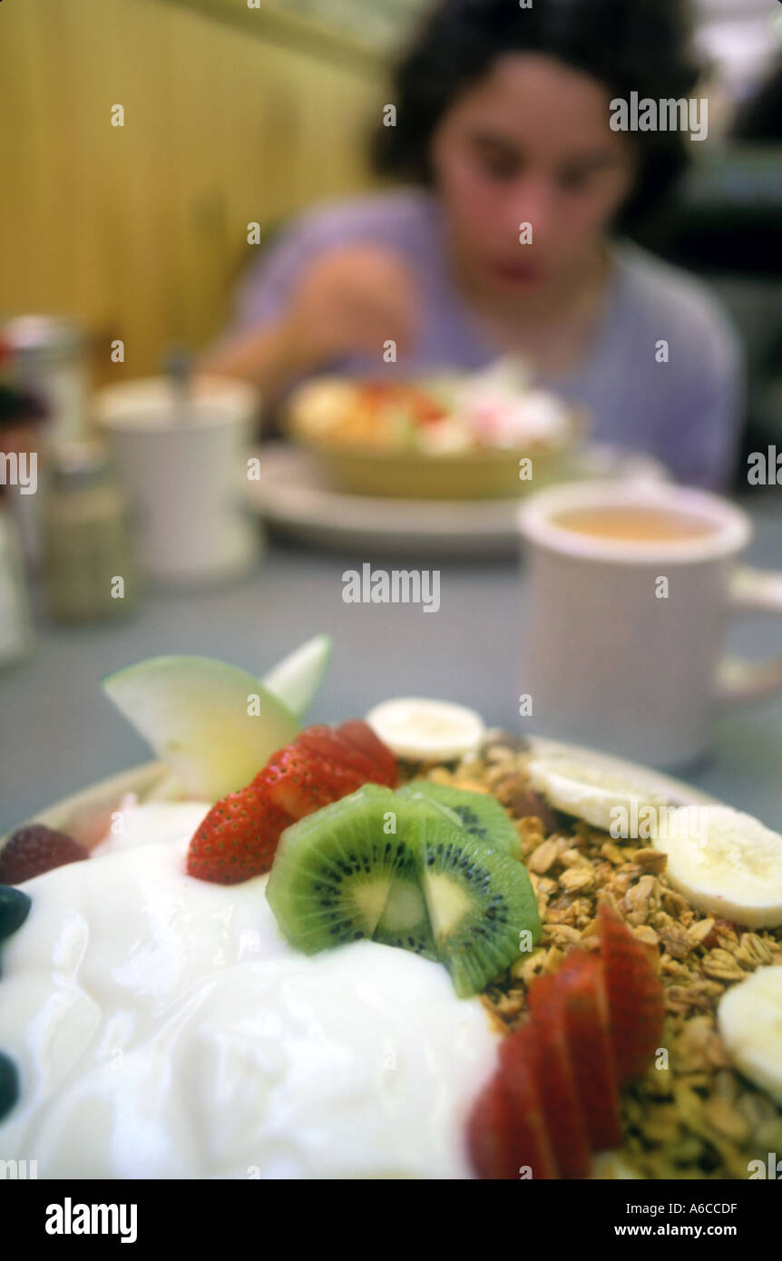 Eating a Healthy Breakfast Fruit and Yogurt Stock Photo - Alamy