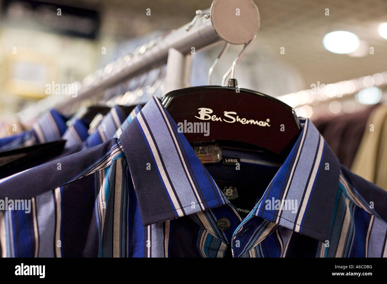 Ben Sherman shirts on hangers on rack Stock Photo - Alamy