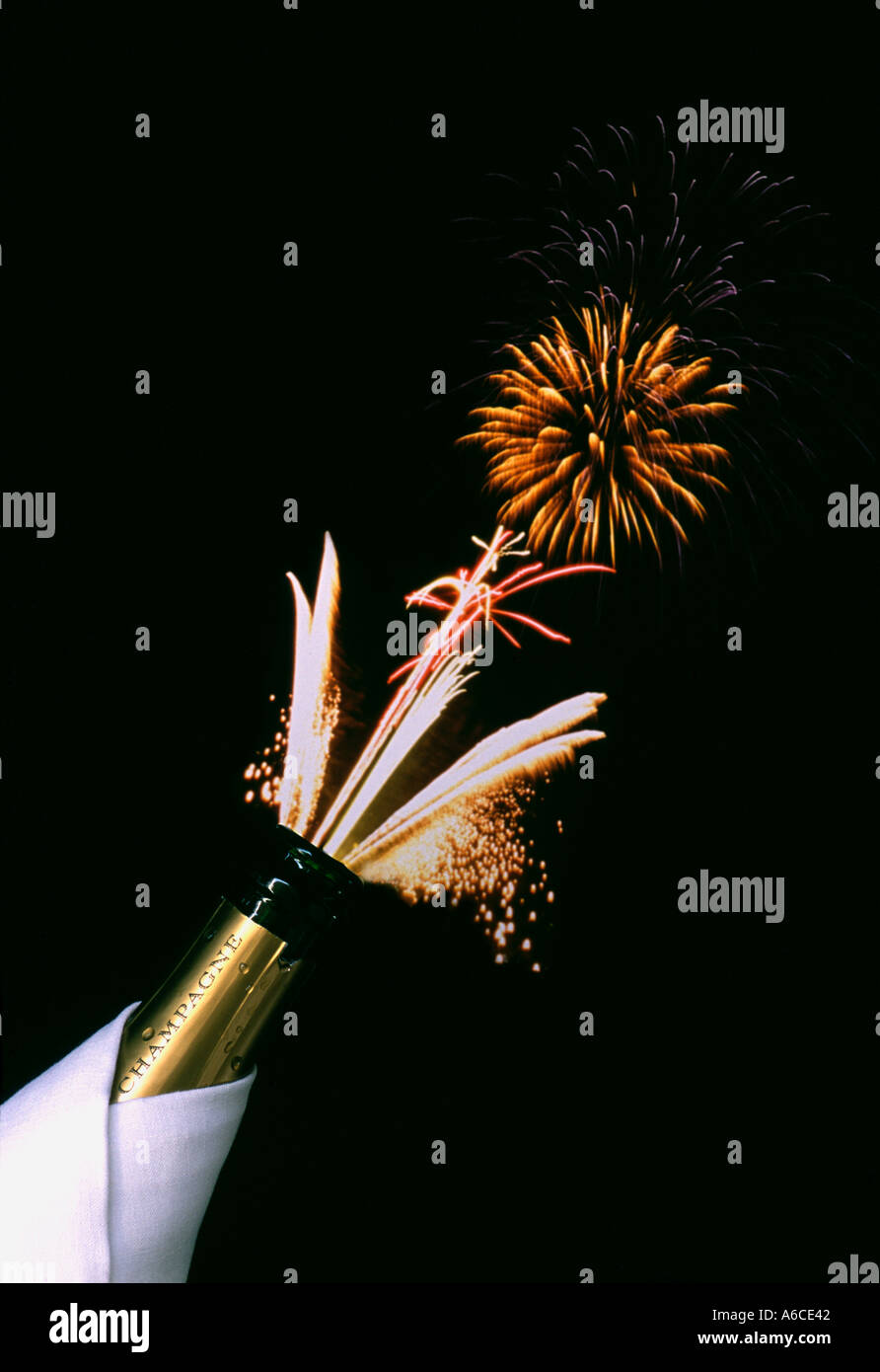 Champagne celebration fireworks appearing to come from bottle concept image Stock Photo