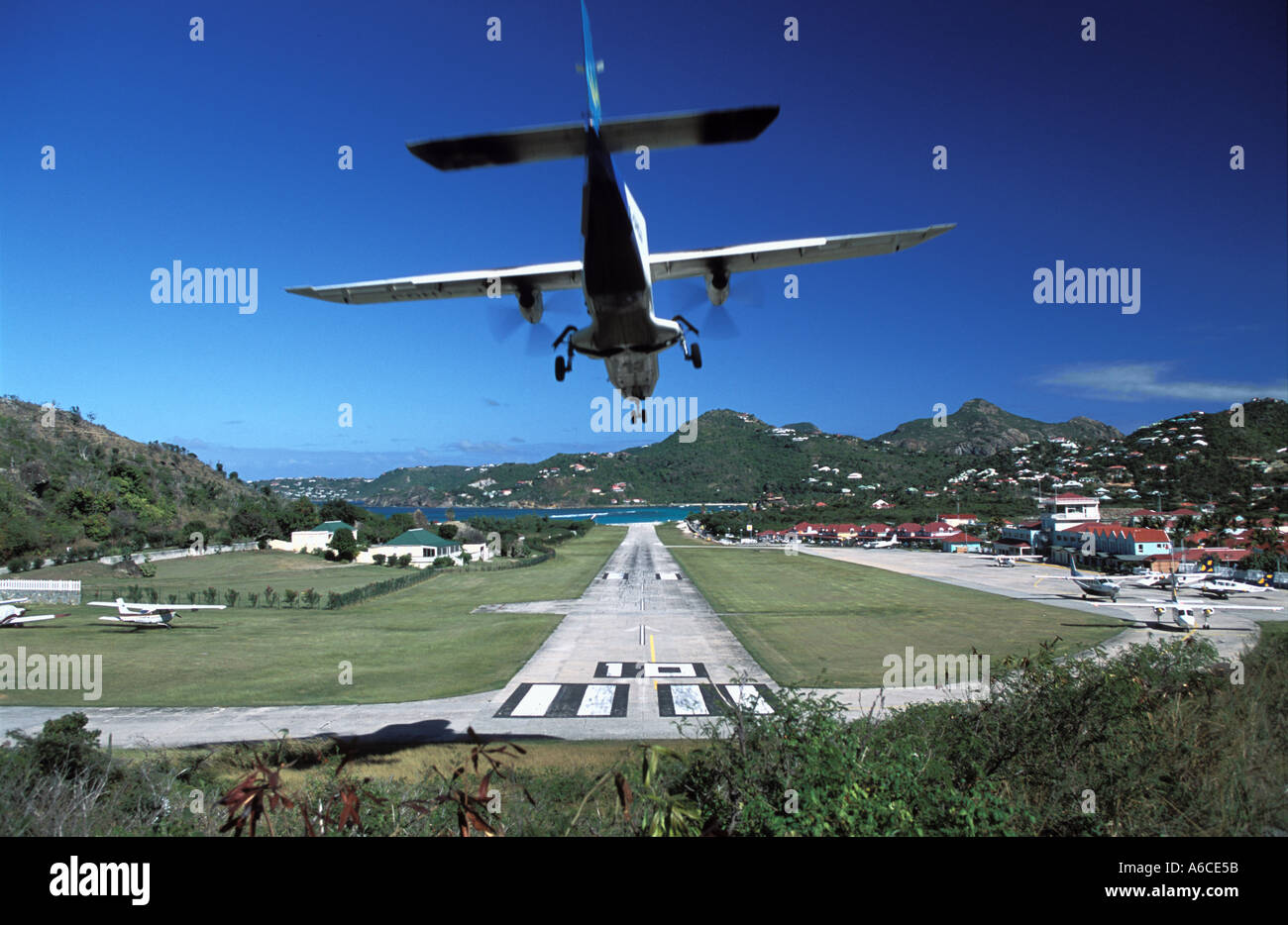 A plane coming in to land at the airport of St Barthelemy, an island in ...