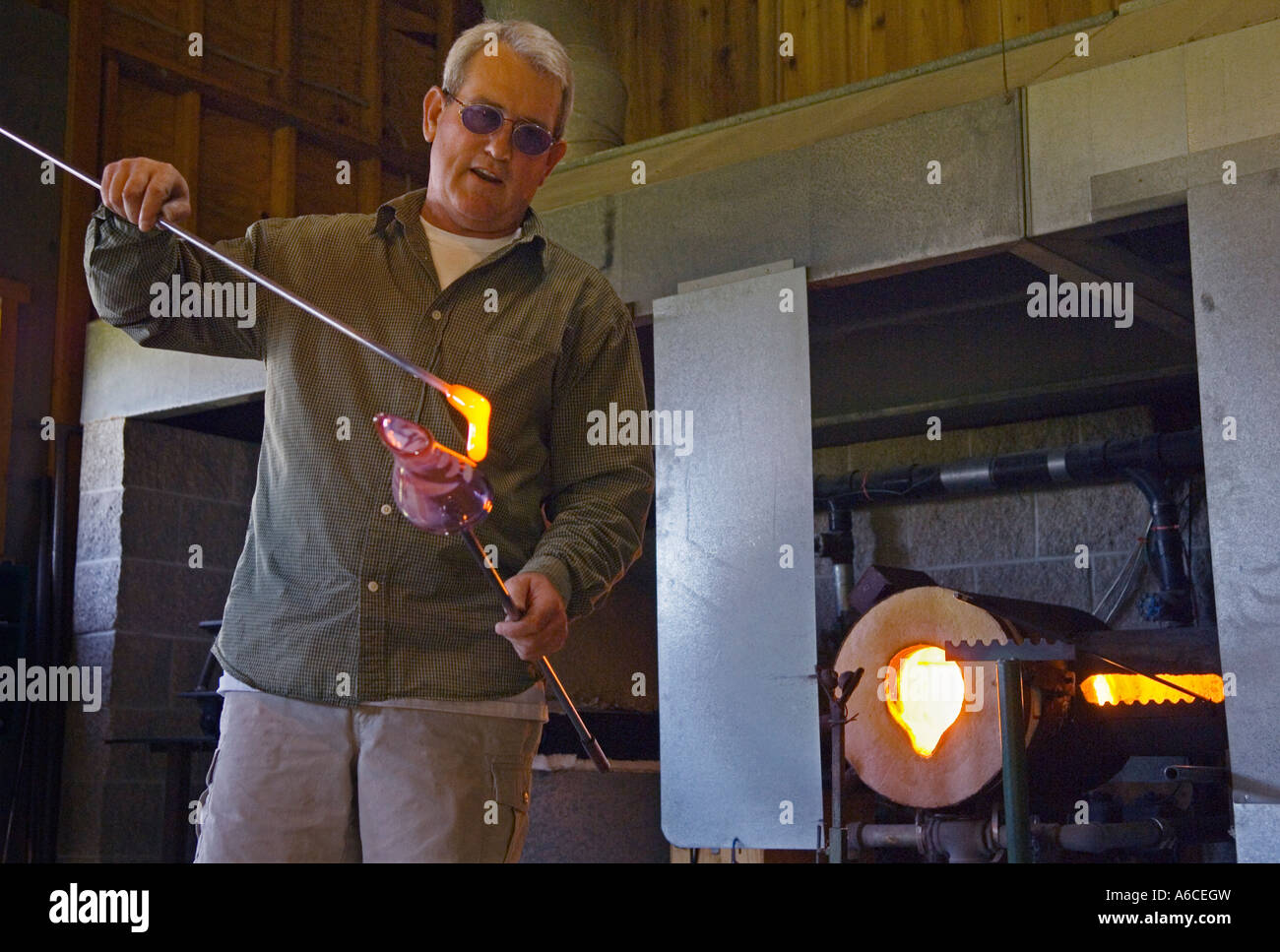 Glass artist at Alder House Gallery Lincoln City Oregon Coast Stock