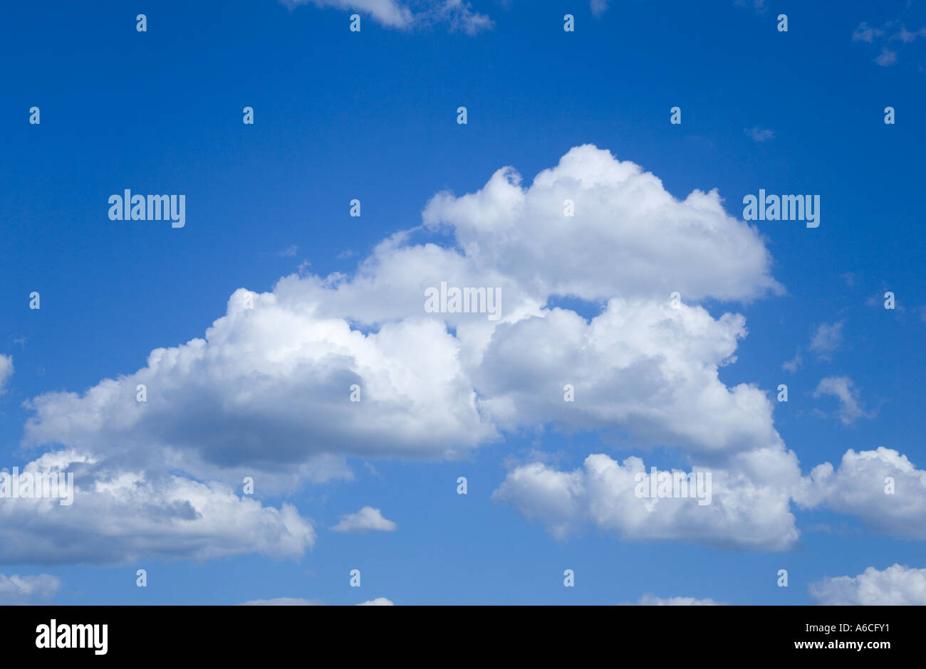 Fluffy White Clouds in Blue Sky Stock Photo - Alamy