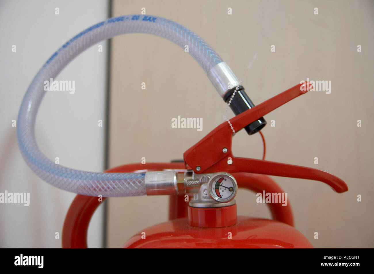 RED FIRE EXTINGUISHER SHOWING PRESSURE GAUGE Stock Photo - Alamy
