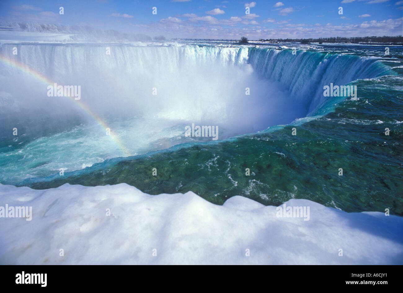 Canada Ontario Niagara Falls Horseshoe Falls in winter with rainbow Stock Photo