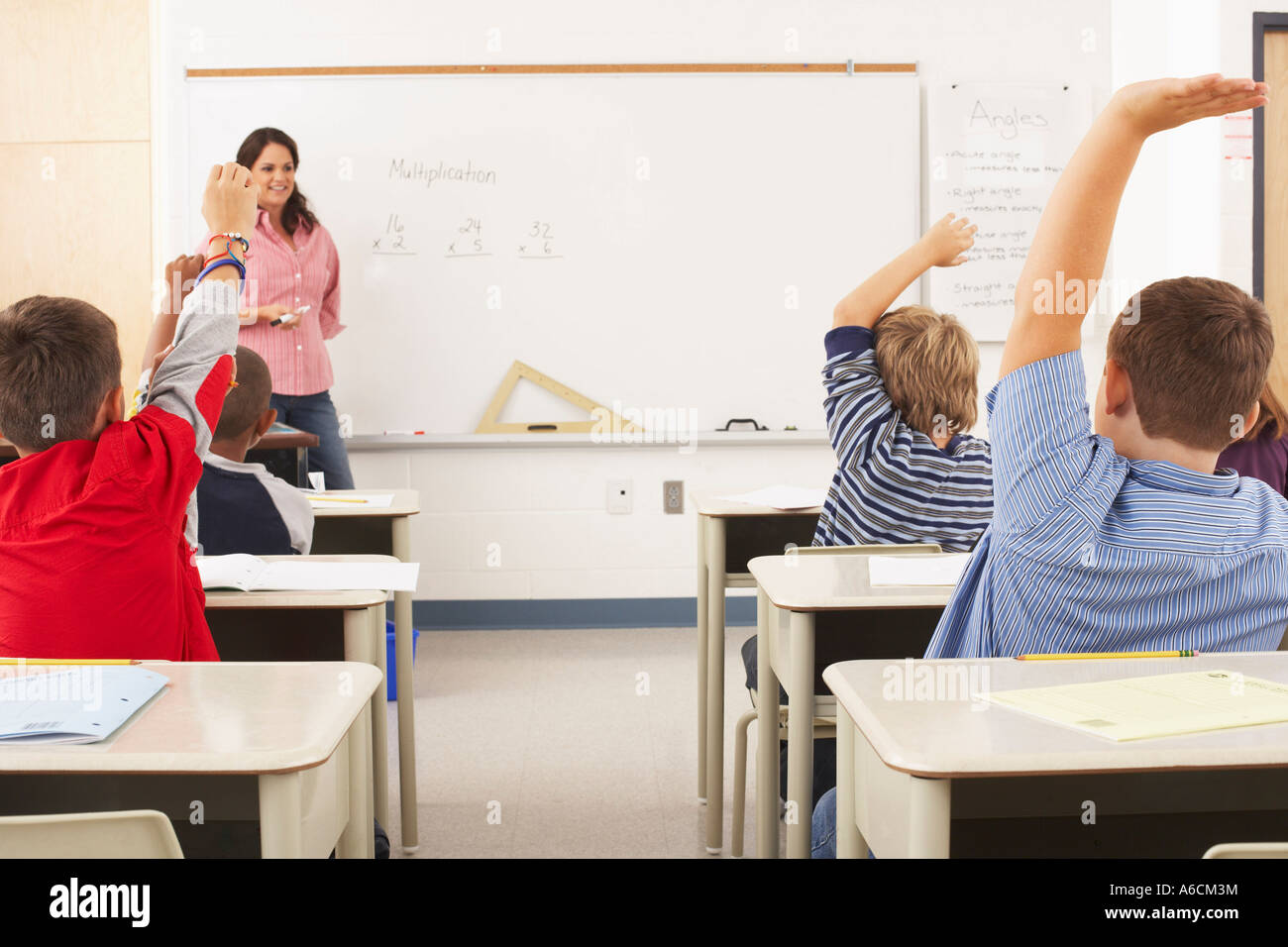 Students and Teacher in Classroom Stock Photo