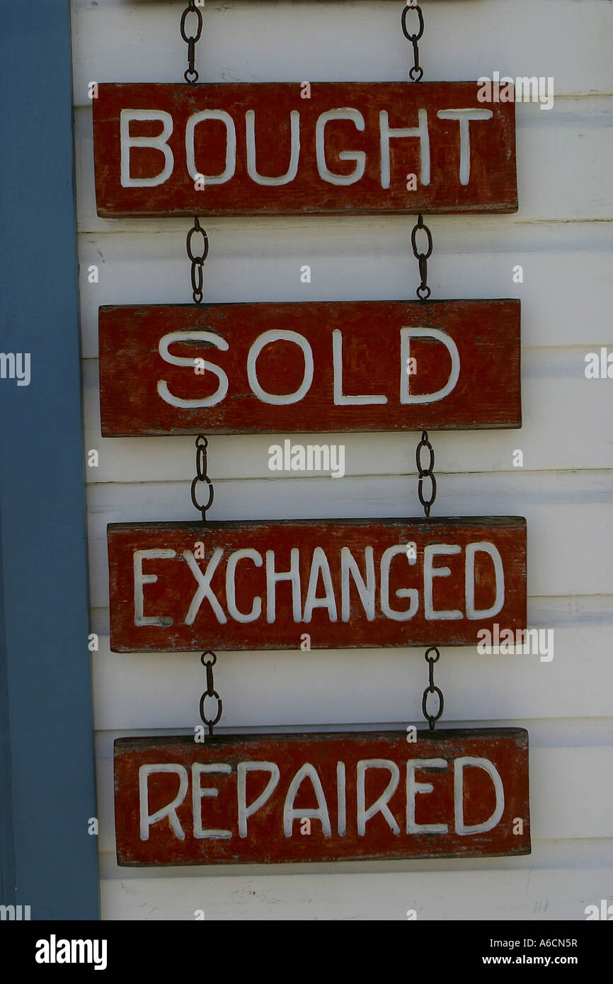 Signs suspended from chains Stock Photo Alamy