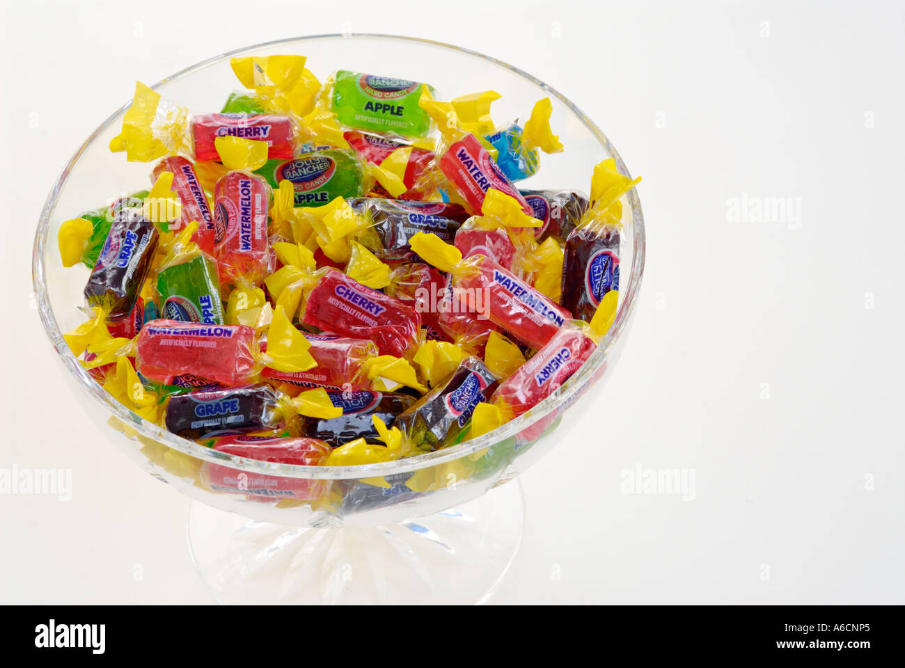 Hard wrapped candy in a crystal bowl Stock Photo Alamy