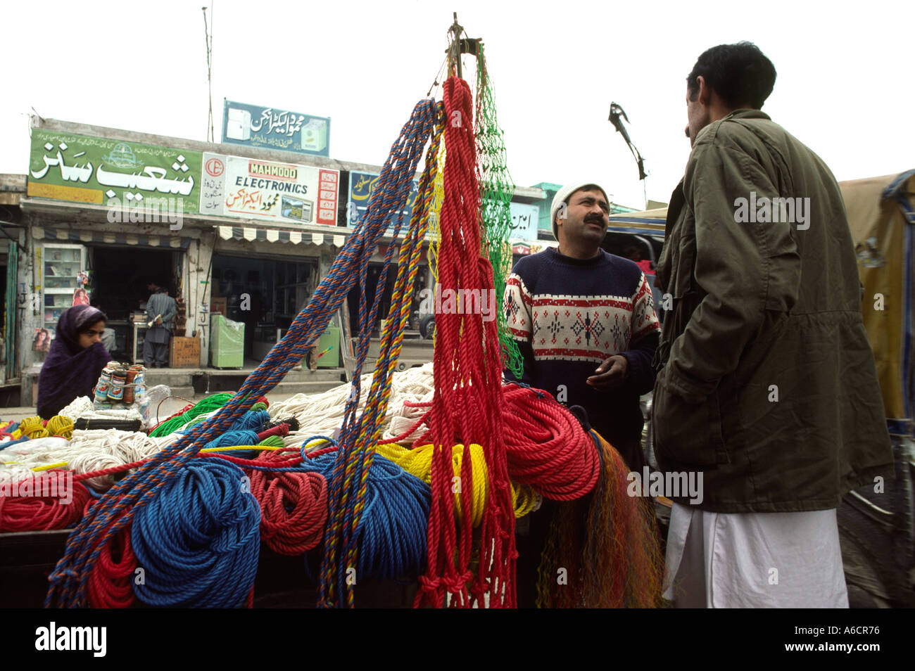 Pakistan Swat Valley Mingora Bazaar rope salesman Stock Photo