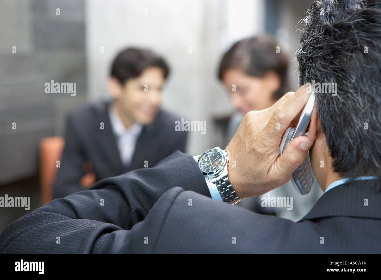 Businessman Using Cell Phone Stock Photo