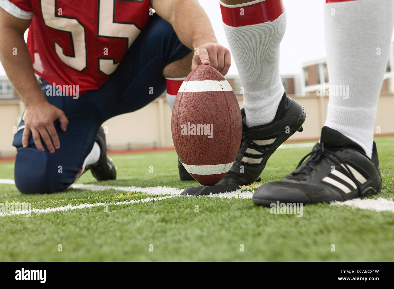 Professional Footballer Kicking Stadium High Resolution Stock
