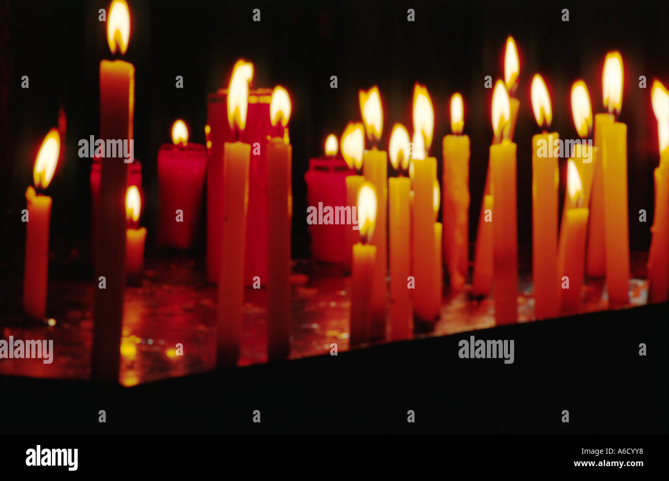 DEVOTIONAL CANDLES inside CATHOLIC CHURCH QUITO ECUADOR Stock Photo Alamy
