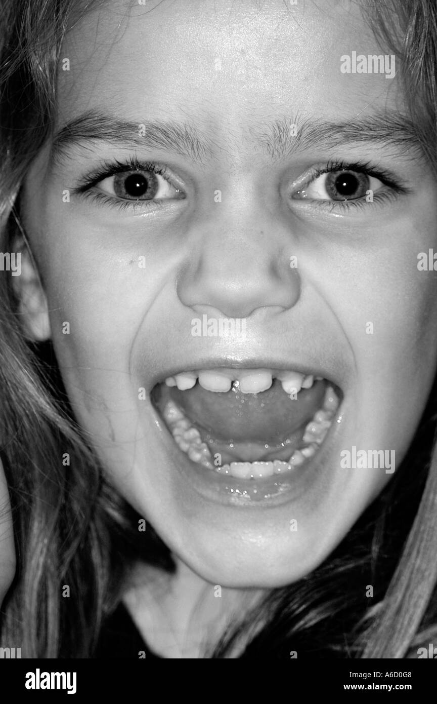 Young Girl Shouting Mouth Open Stock Photo