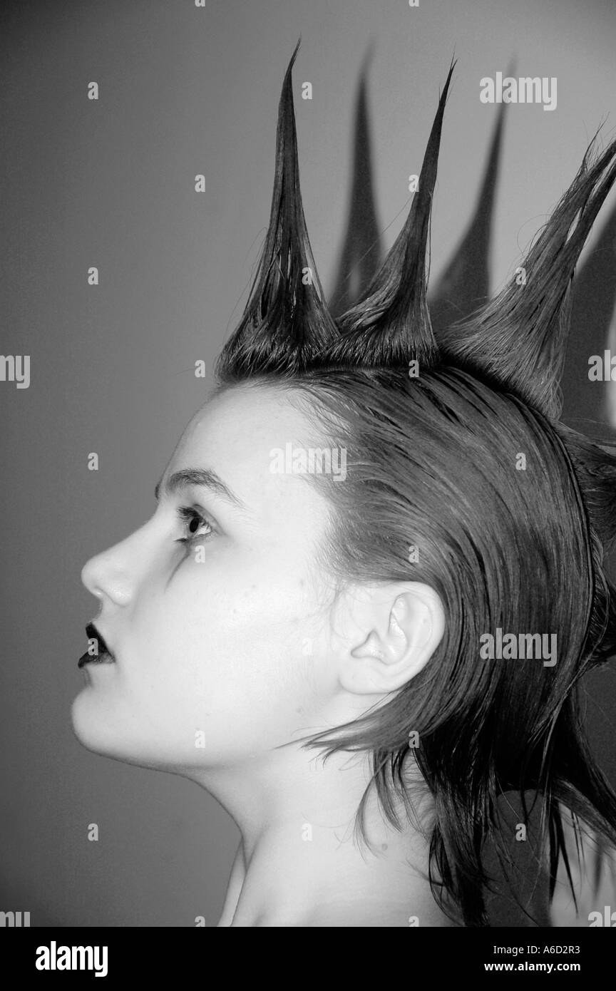 Punk teenage girl with liberty spikes black and white Stock Photo