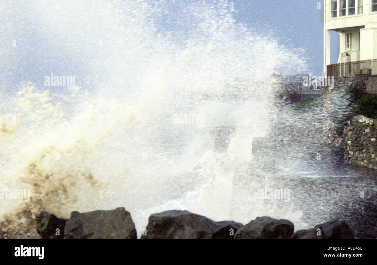 Waves breaking over sea wall in gale at Anchor Head Weston super Mare England Stock Photo