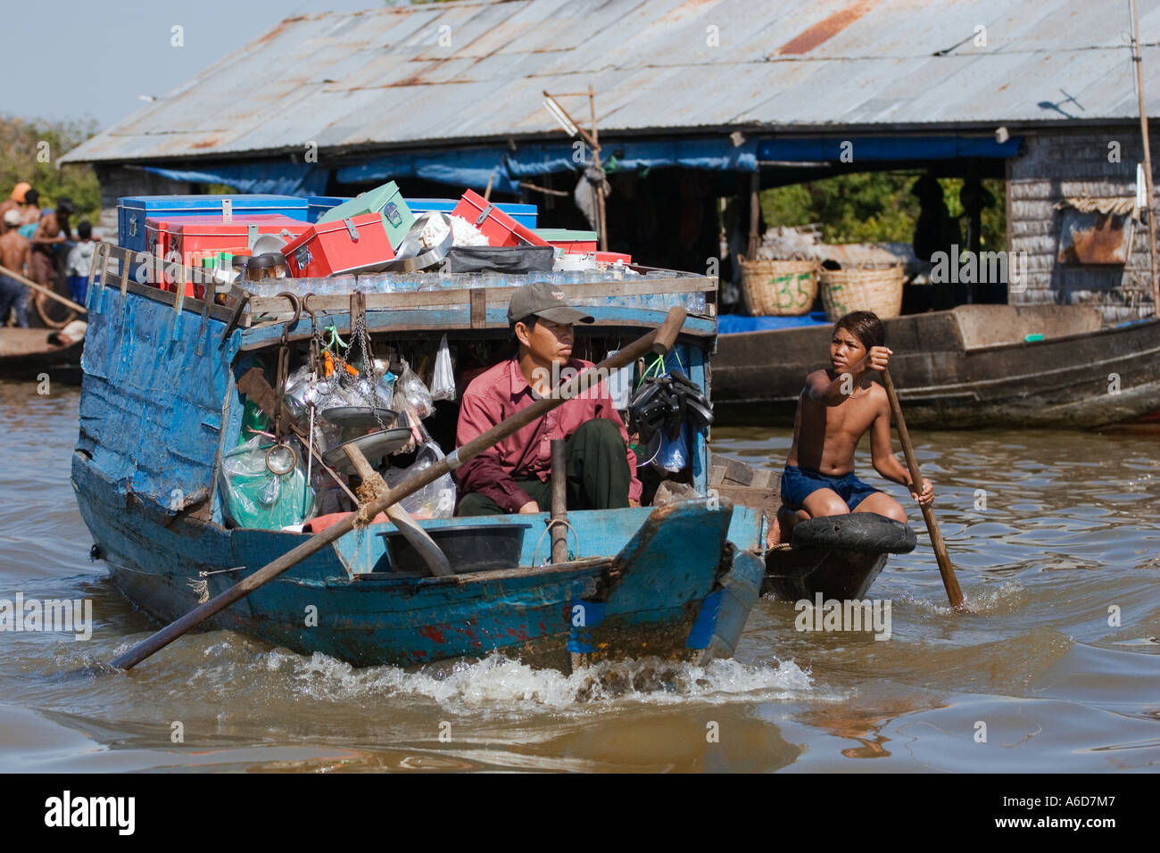 Merchant boat in the Vietnamese floating village of Chong Kneas on lake Tonle Sap Siem Reap Cambodia Stock Photo