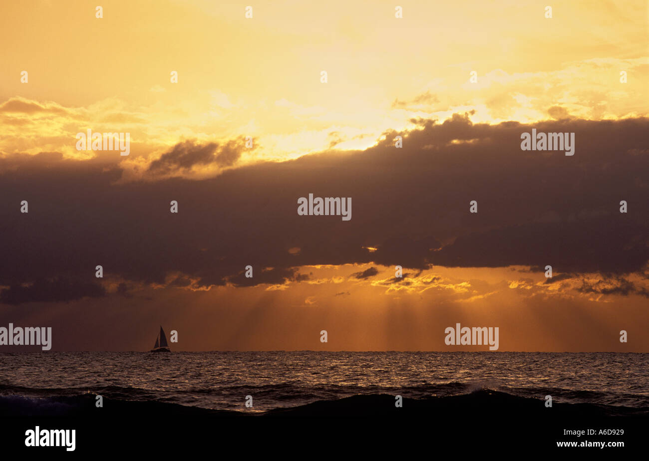 ocean sunrise with boat caloundra queensland australia Stock Photo