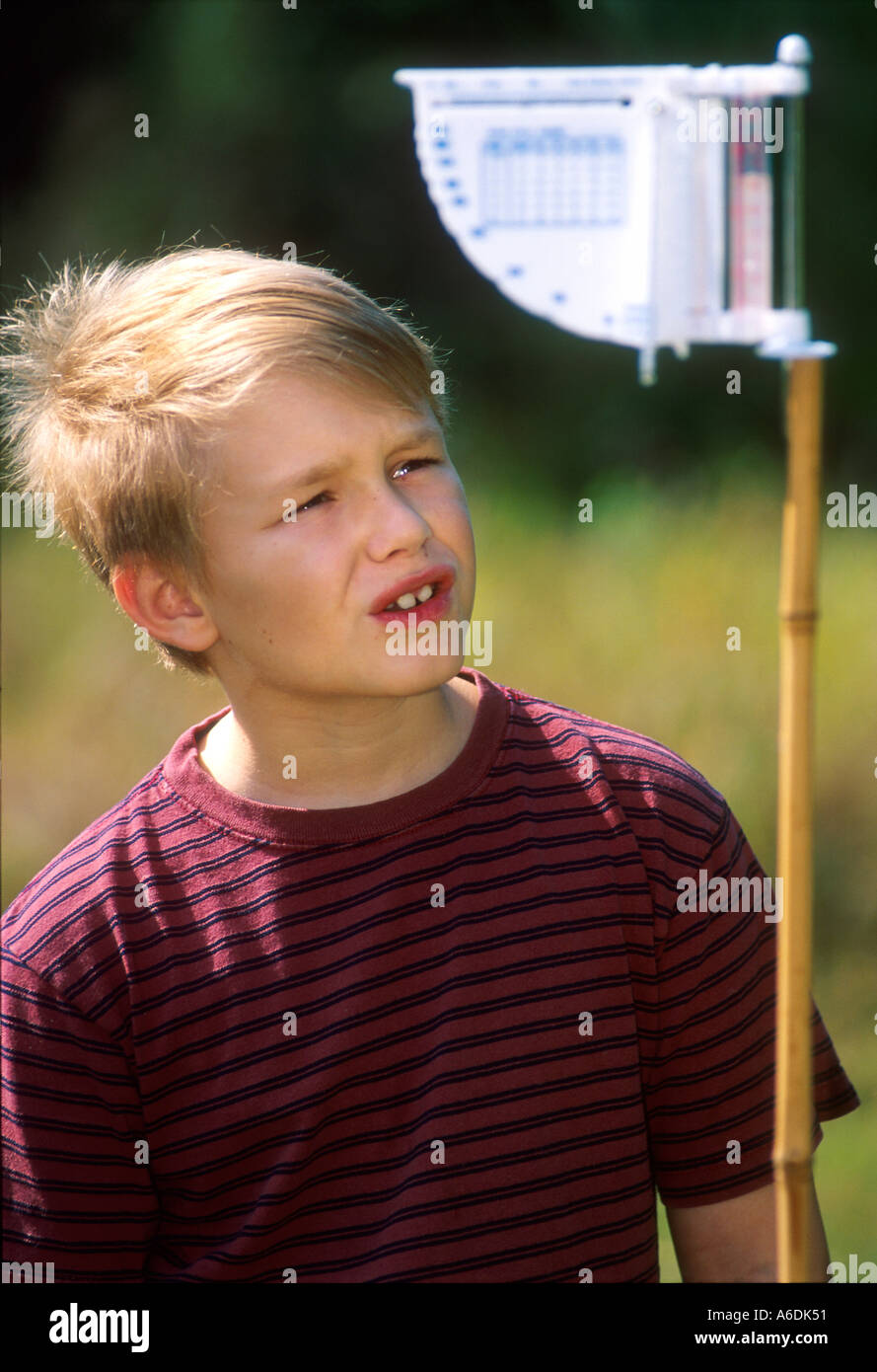 Boy with weather station science learning wonder child MR PR Stock Photo