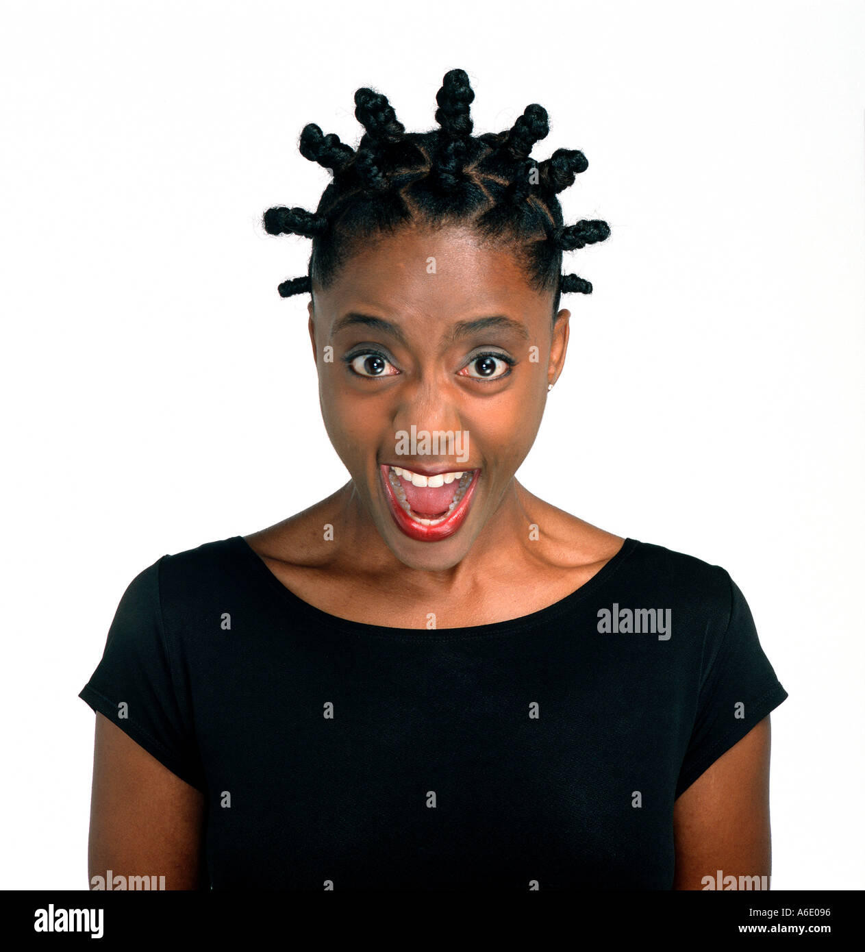 African american woman with cornrow hair screams in portrait. Stock Photo