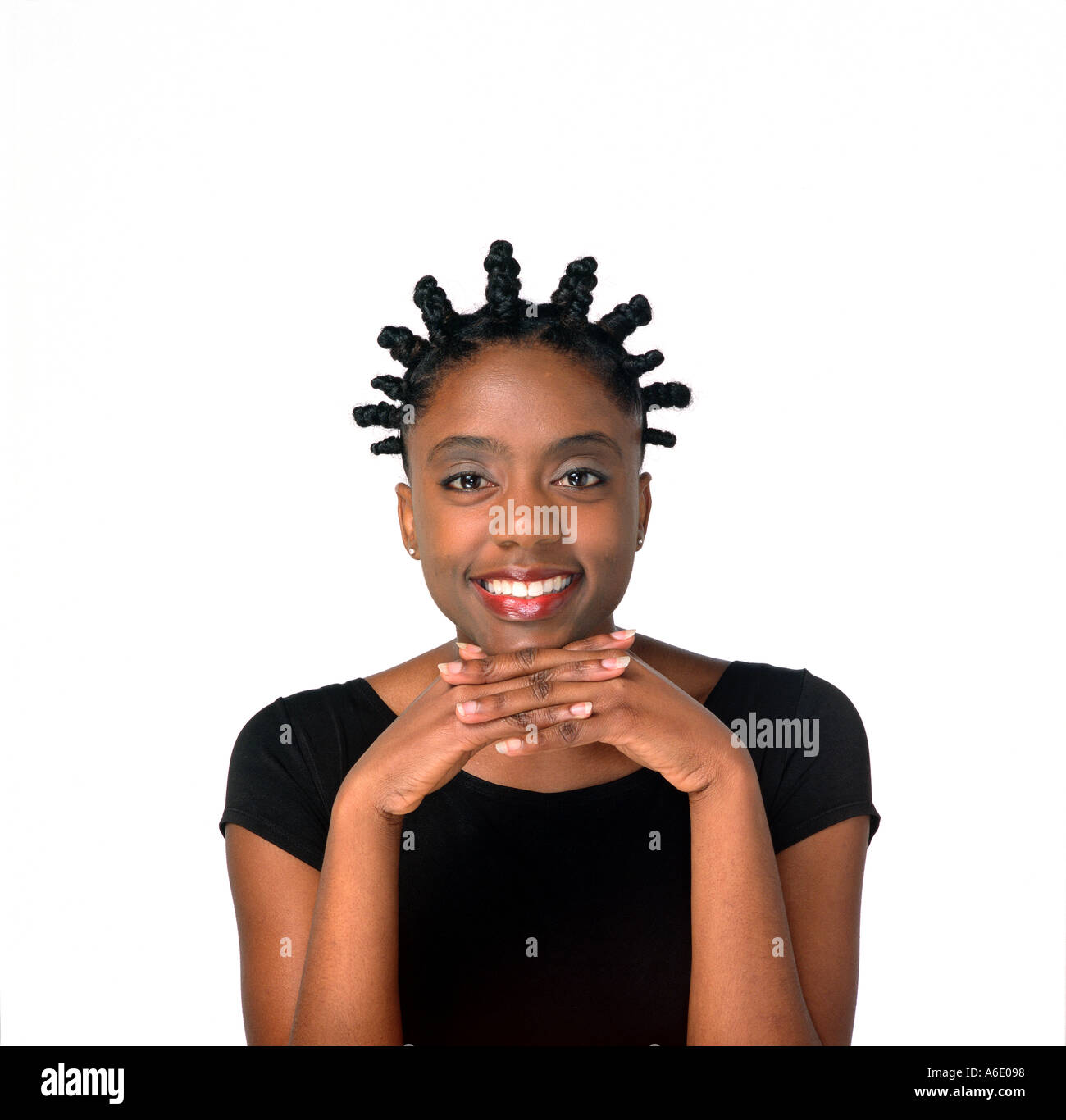 African american woman with cornrow hair poses in portrait. Stock Photo