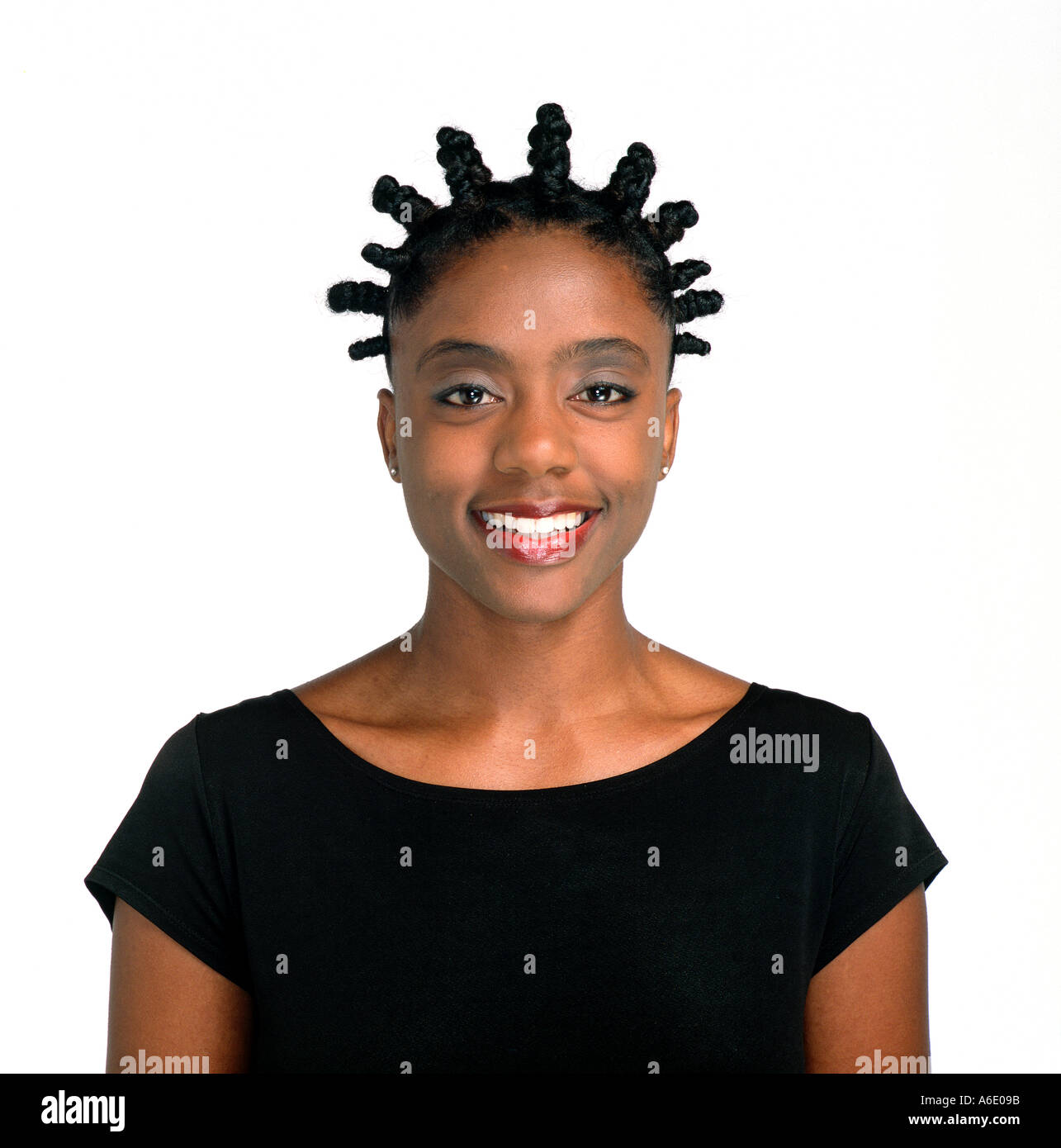 African american woman with cornrow hair poses in portrait. Stock Photo