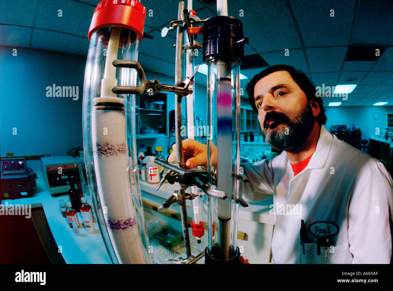 Male lab tech works with laboratory testing equipment Stock Photo Alamy