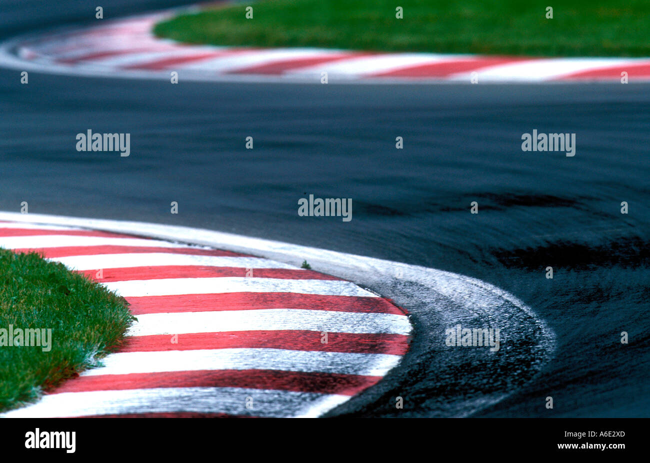 Red and white kerb on a race track Stock Photo