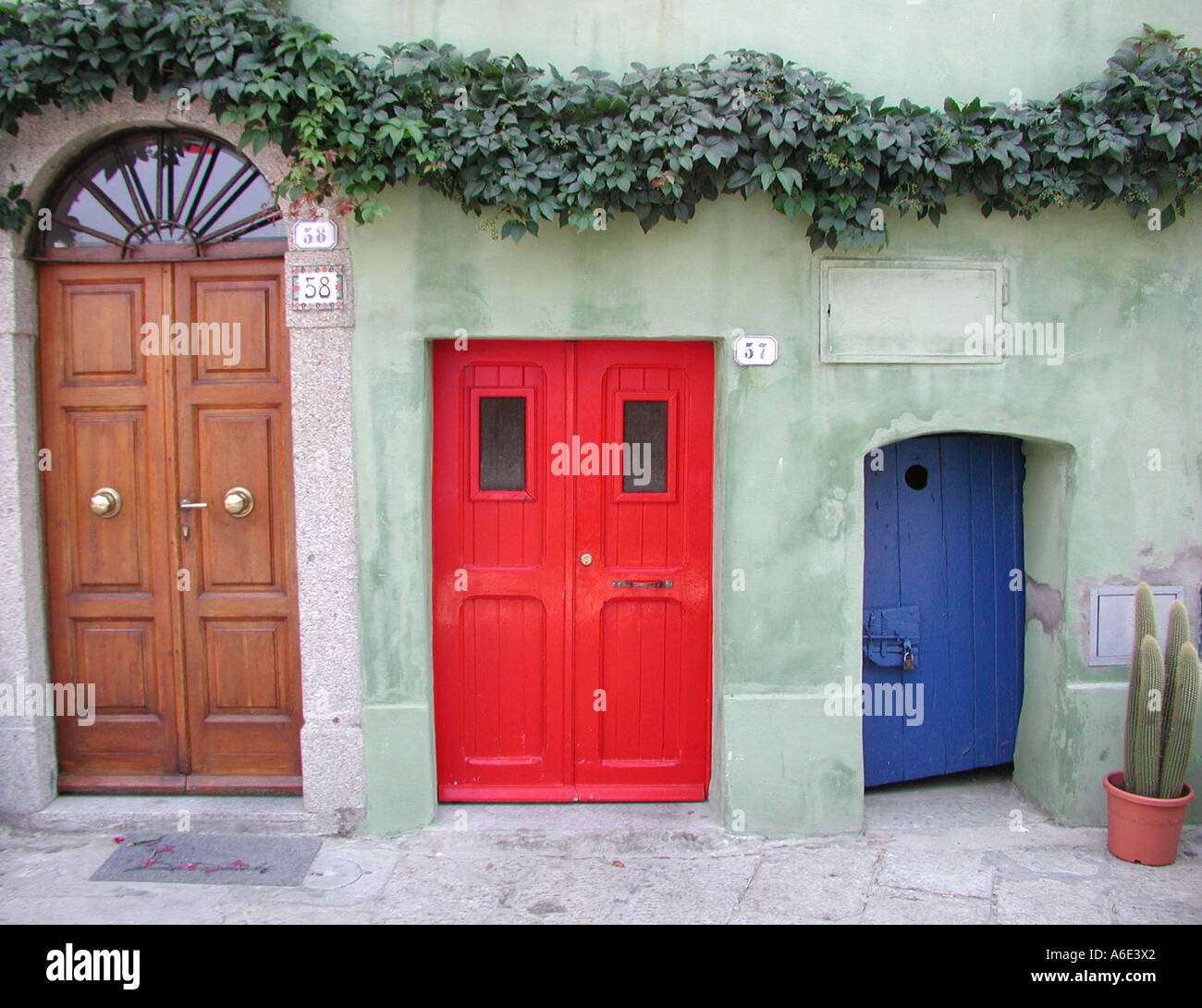 01.08.2003, ITA, Giglio multicolored entry doors on the island Giglio, Maremma Toskana, Porto Santo Stefano Stock Photo