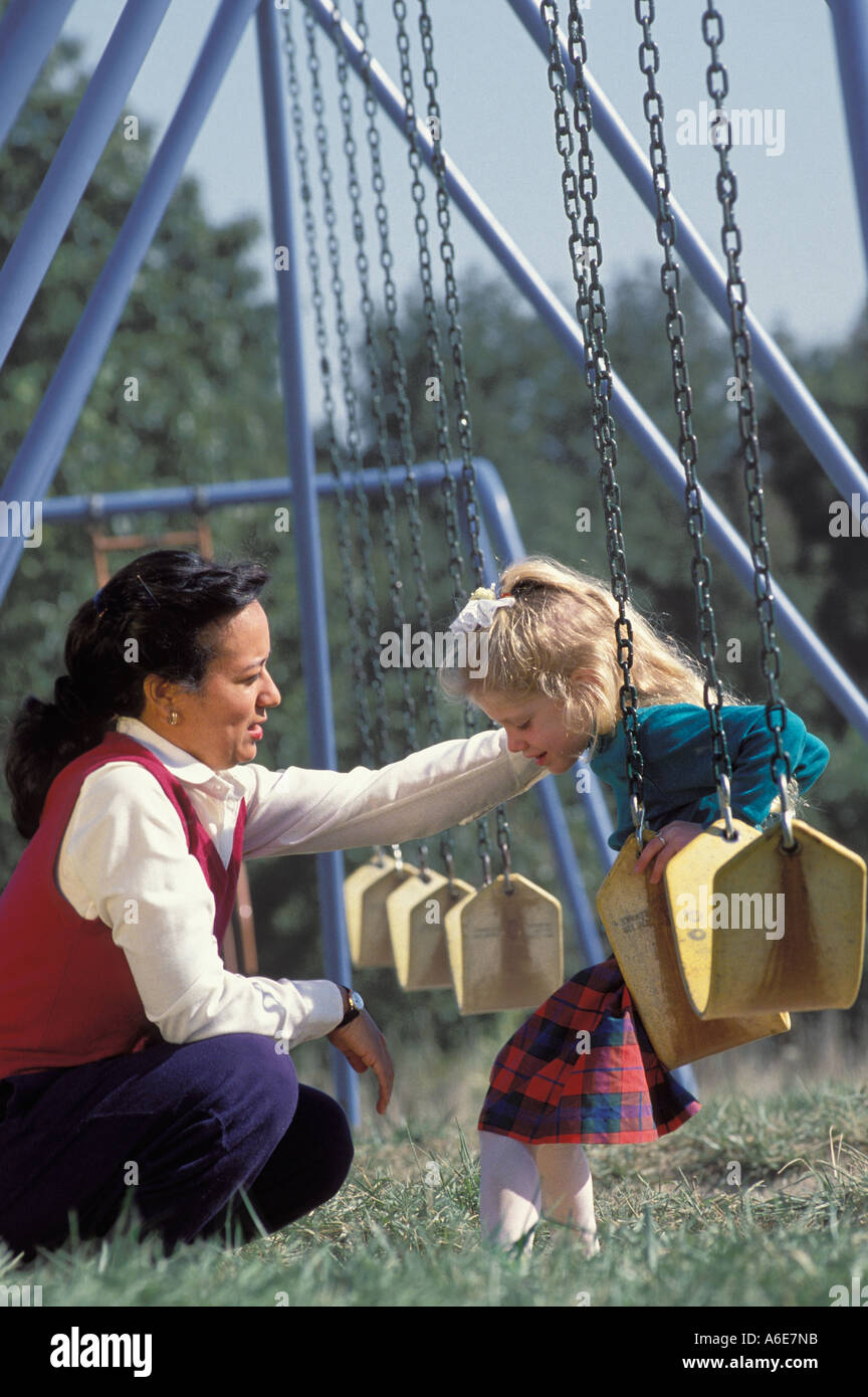 mother and child at a playground Stock Photo