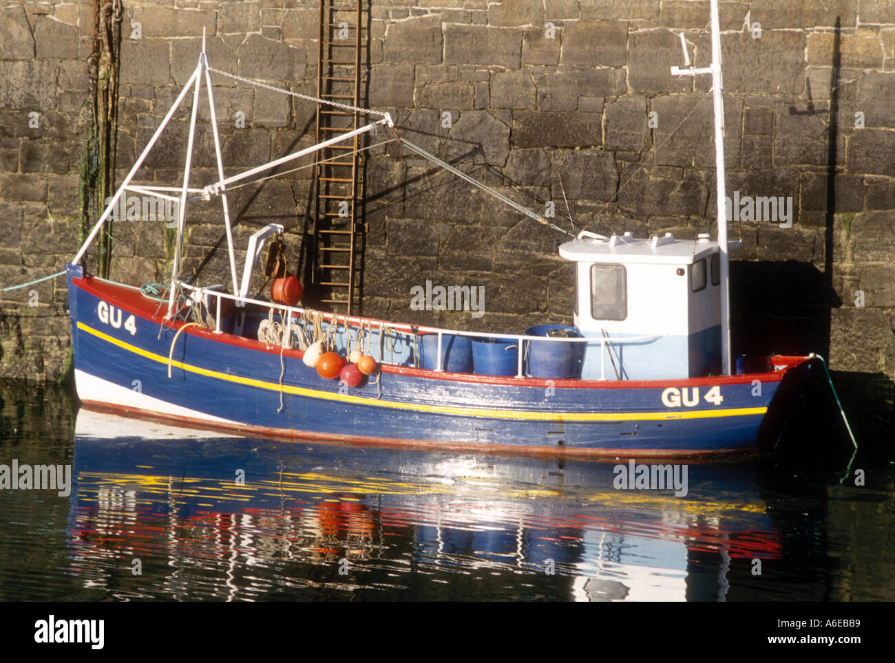 A Guernsey registered motor fishing vessel potting boat at St Peter