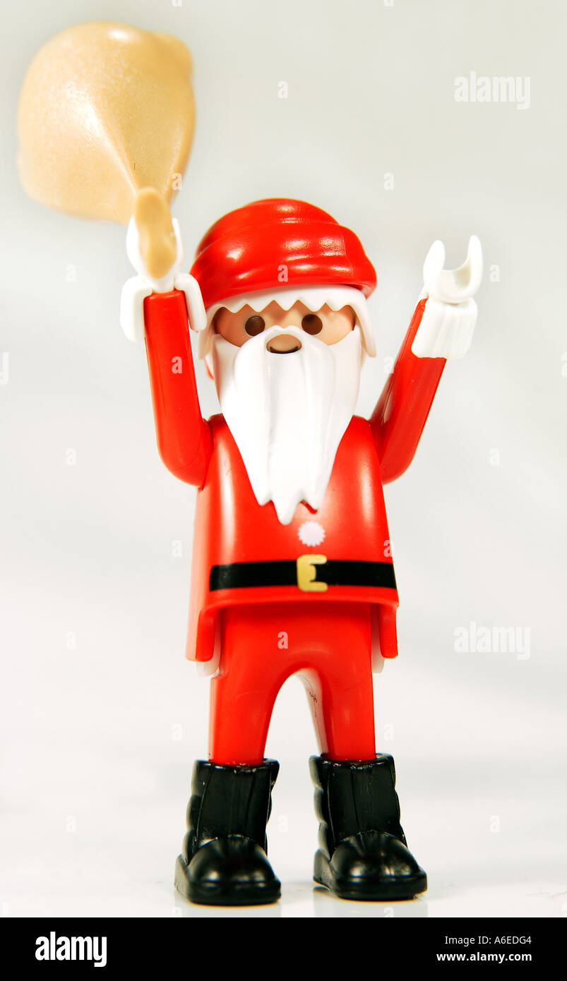 Funny Santa Claus swings his sack Stock Photo