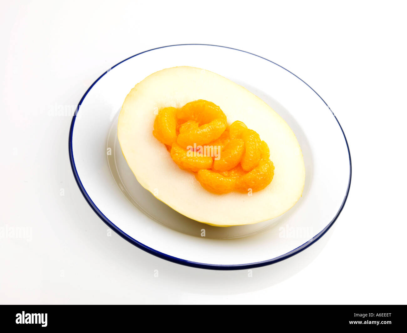 Honey Dew Melon with Mandarin Stock Photo Alamy