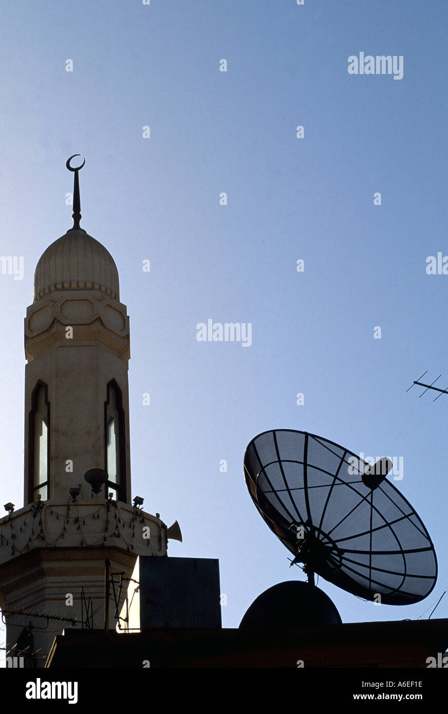 Satellite dish beside mosque minaret Dubai United Arab Emirates UAE