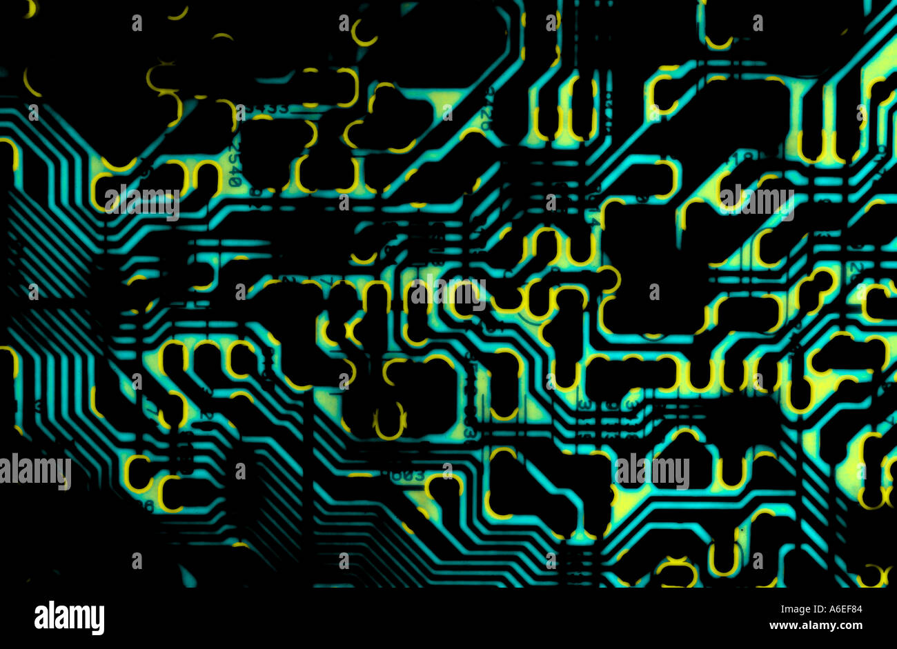 electronic circuitboard abstract image with light projected from behind Stock Photo