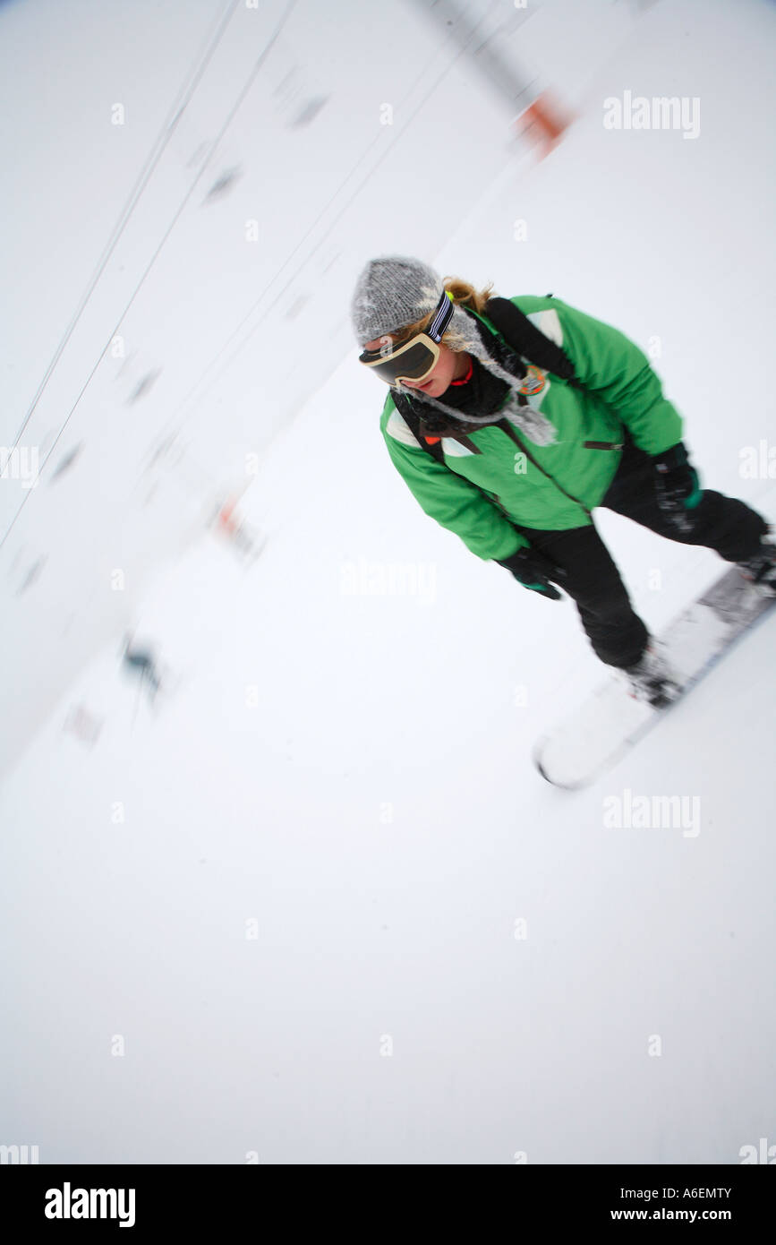 Snowboarder in action during winter sports in the French Alps Tarentaise Savoy Savoie Peisey Les Arcs La Plagne France Stock Photo