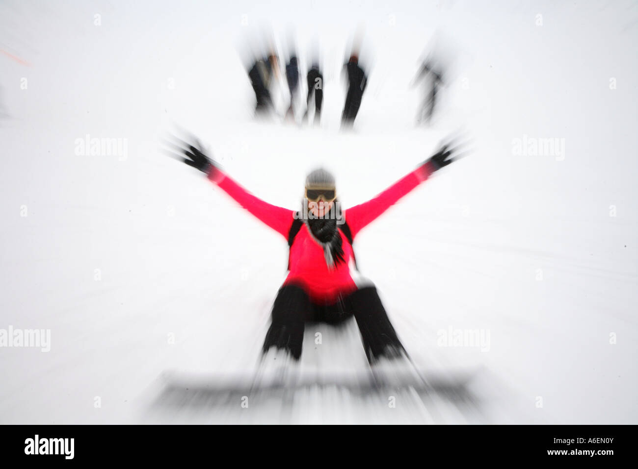 Snowboarder in action during winter sports in the French Alps Tarentaise Savoy Savoie Peisey Les Arcs La Plagne France Stock Photo
