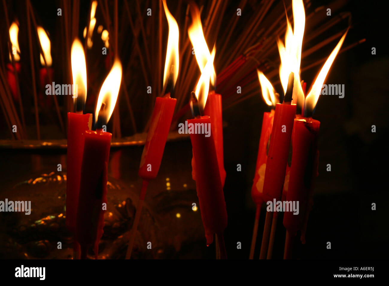 Chinese red candles in a temple Stock Photo Alamy