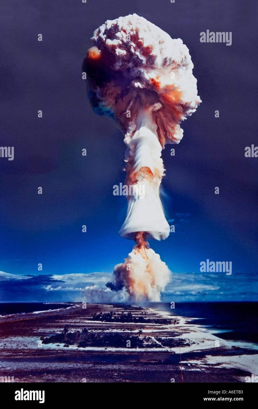 Mushroom of a nuclear bomb explosion over Mururoa atoll, French Polynesia, Pacific Ocean Stock Photo