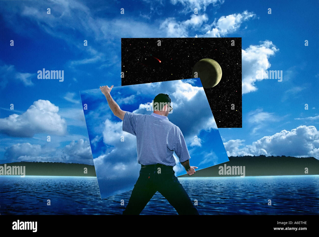 Digital photographic illustration showing person removing section of daytime sky to reveal the night sky Stock Photo