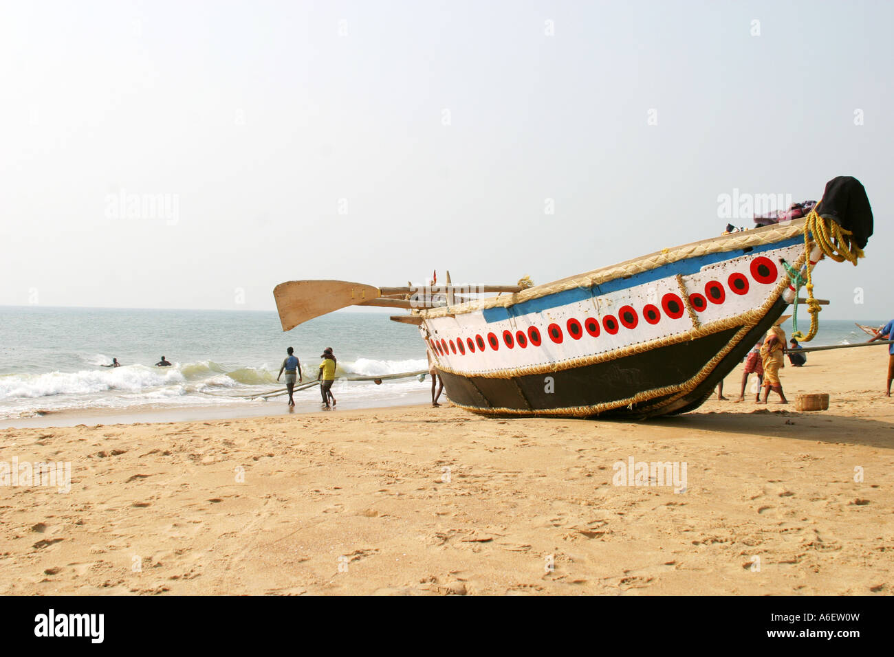 Fishing boat on the sands at Puri ,Bay of Bengal Orissa India Fishing